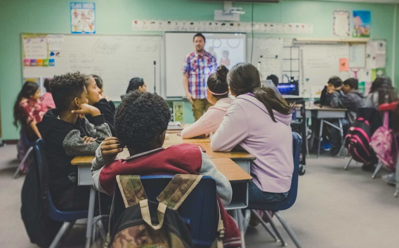 Students working together in a classroom.